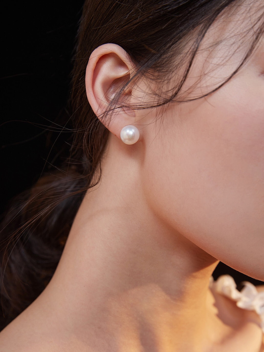 A pair of elegant Pure Freshwater Pearl Stud Earrings featuring natural pearls set in sterling silver and gold vermeil.