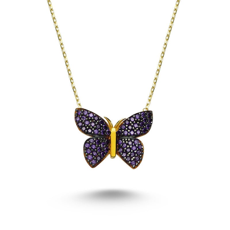 A beautiful Purple Butterfly Silver Necklace featuring a sparkling CZ crystal pendant, handmade from 925 sterling silver with a delicate chain.