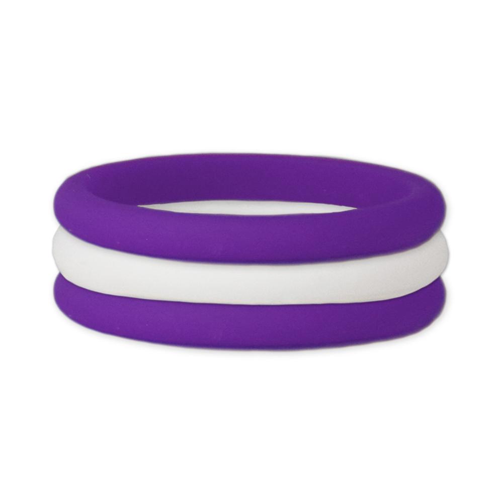 Purple and white stackable silicone ring displayed on a neutral background, showcasing its sleek design and vibrant colors.