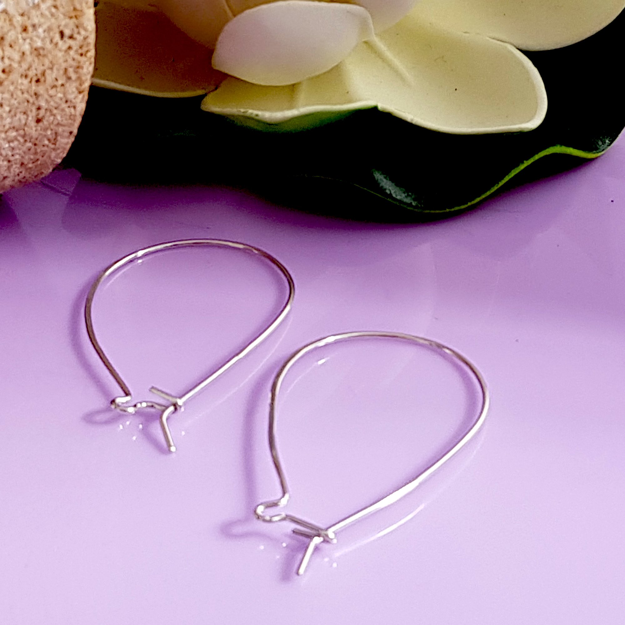 Quality Large Kidney Silver 925 Handmade Ear Hooks showcasing their elegant design and shine.