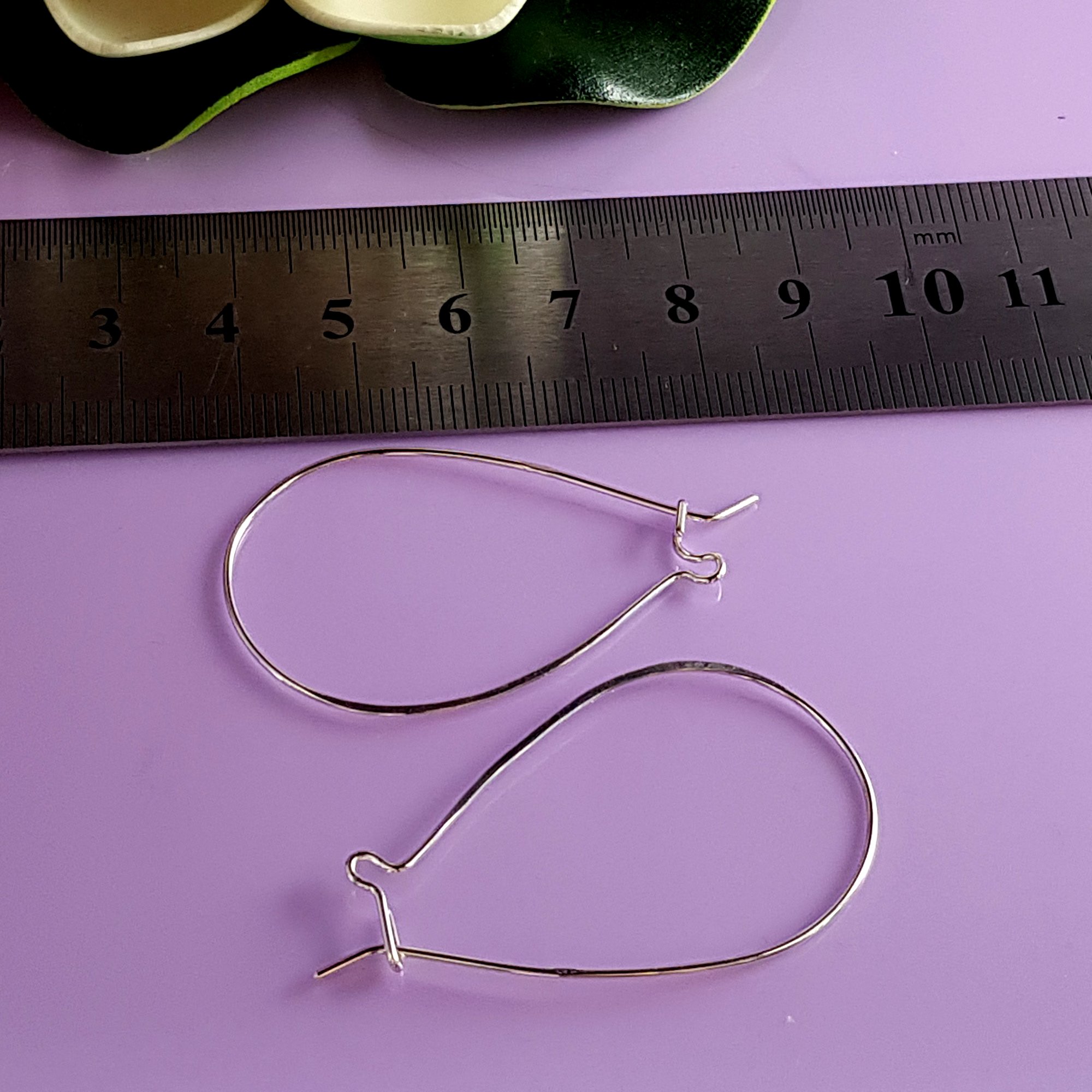 Quality Large Kidney Silver 925 Handmade Ear Hooks showcasing their elegant design and shine.