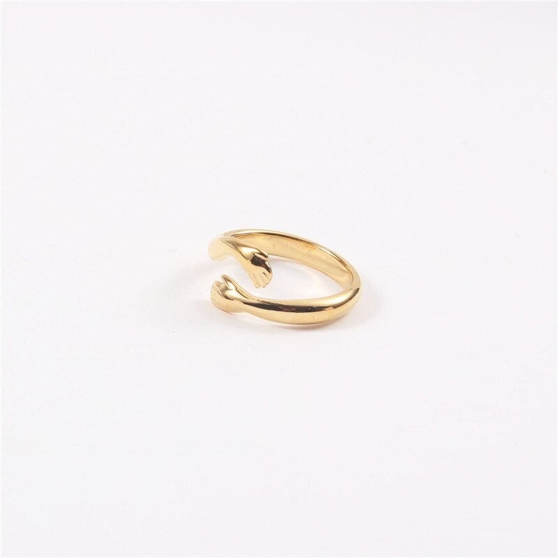 Quinn Love Hug Ring featuring a unique adjustable design in stainless steel with 18Kt yellow gold coating.