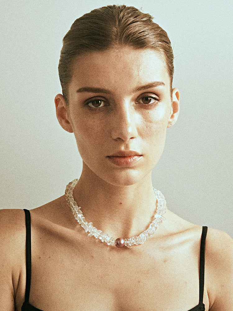 Radiant Majesty Transparent Crystal and Pearl Necklace featuring natural conch pearls and clear crystals, showcasing elegance and unique design.