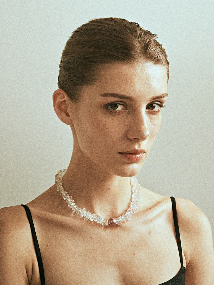 Radiant Majesty Transparent Crystal and Pearl Necklace featuring natural conch pearls and clear crystals, showcasing elegance and unique design.