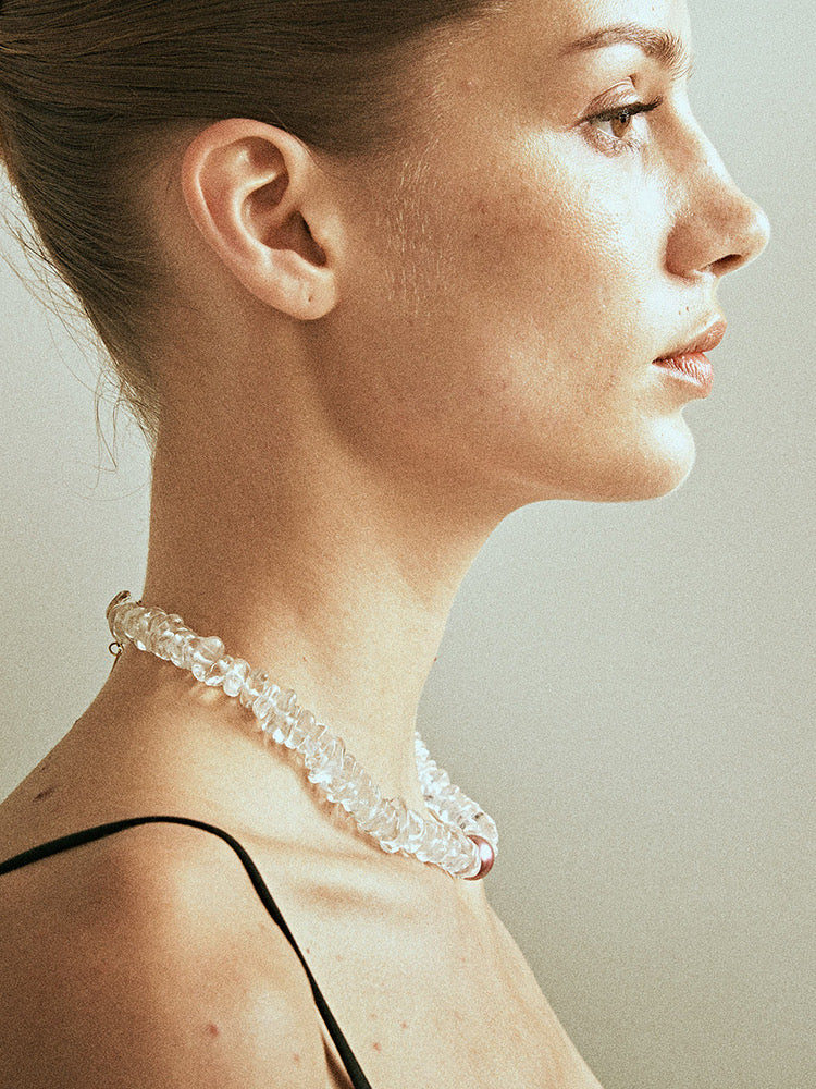 Radiant Majesty Transparent Crystal and Pearl Necklace featuring natural conch pearls and clear crystals, showcasing elegance and unique design.