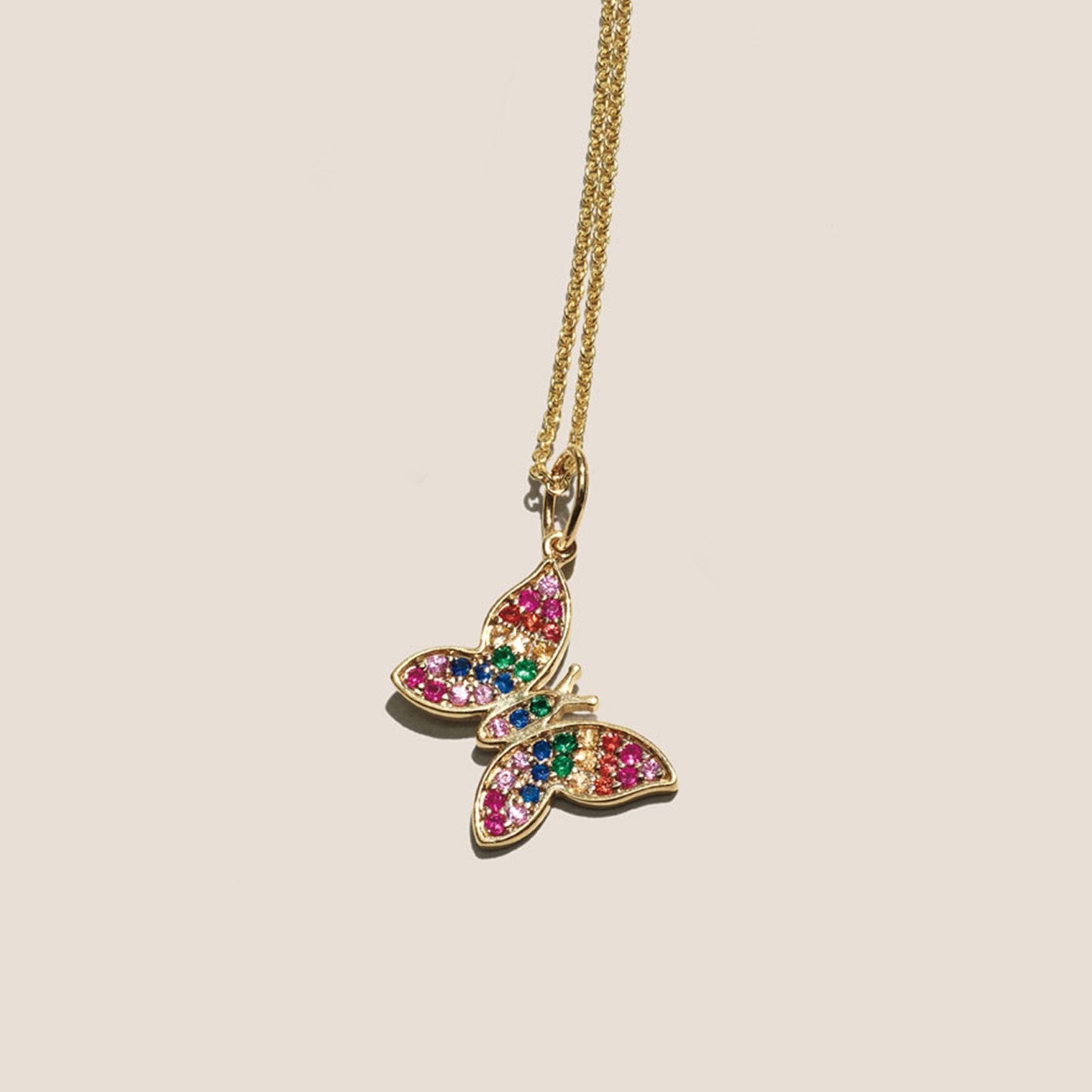 A beautiful Rainbow Austrian Elements Pendant Necklace featuring 14K gold plating and colorful stones, showcasing a unique design.