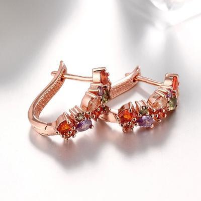 Rainbow Elements Mona Lisa Earrings featuring certified crystals and 18K rose gold plating, elegantly designed for comfort and style.