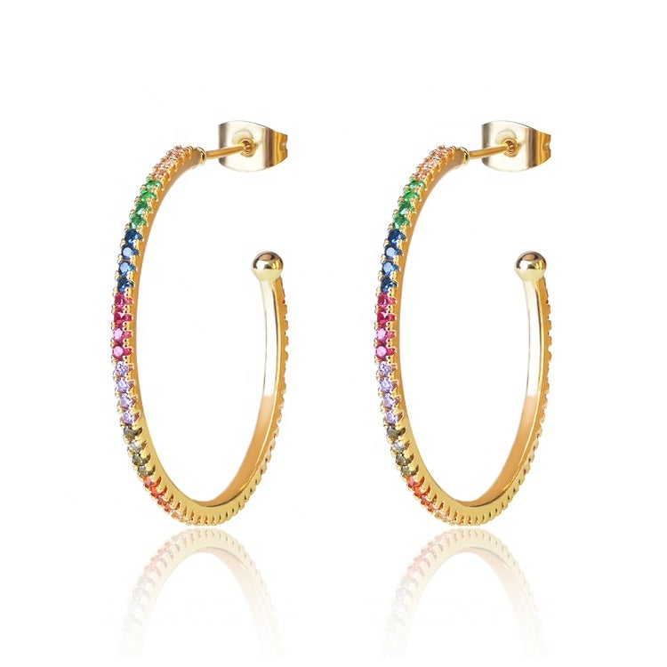 Colorful rainbow hoop earrings with gold plating and cubic zirconia stones, showcasing a vibrant and elegant design.