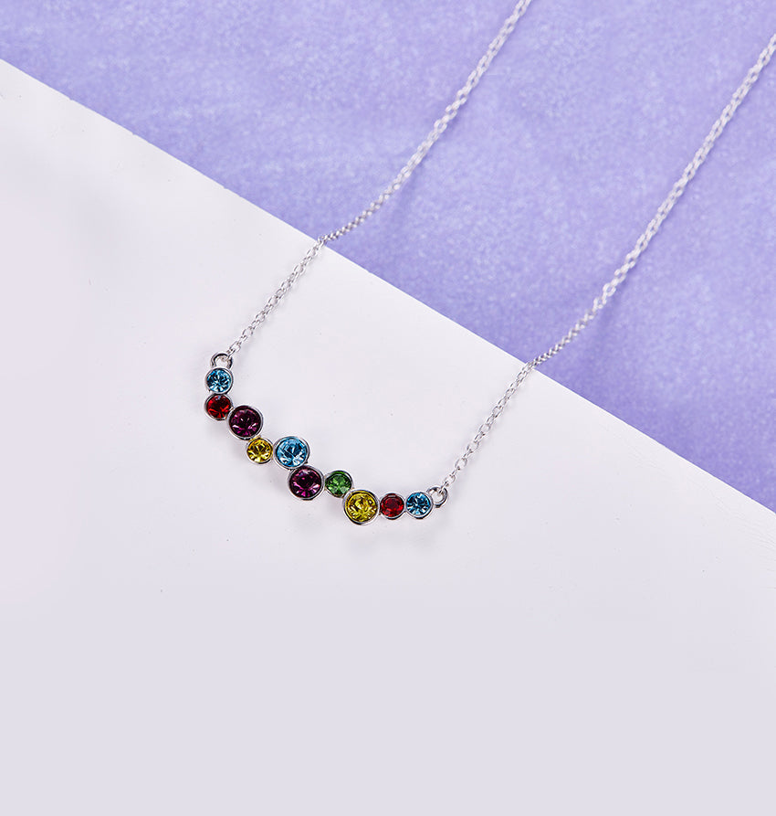 Rainbow of Love Necklace featuring rhodium plating and multi-color cubic zirconia stones on a link chain.