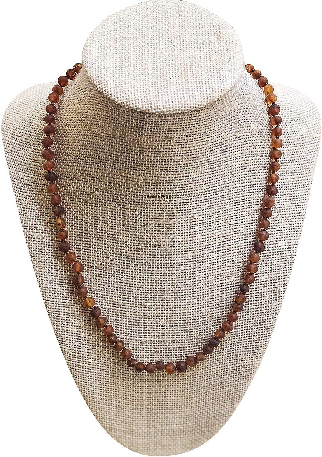 Raw Cognac Adult Amber necklace, 18 inches long, featuring individually knotted beads and a screw clasp for safety.