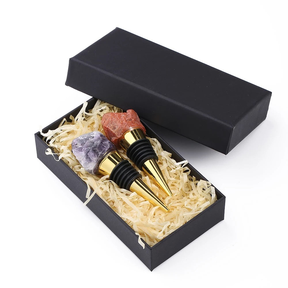 A luxurious Raw Crystal Wine Stopper with a gold finish, showcasing unique handcrafted raw crystals in various colors.