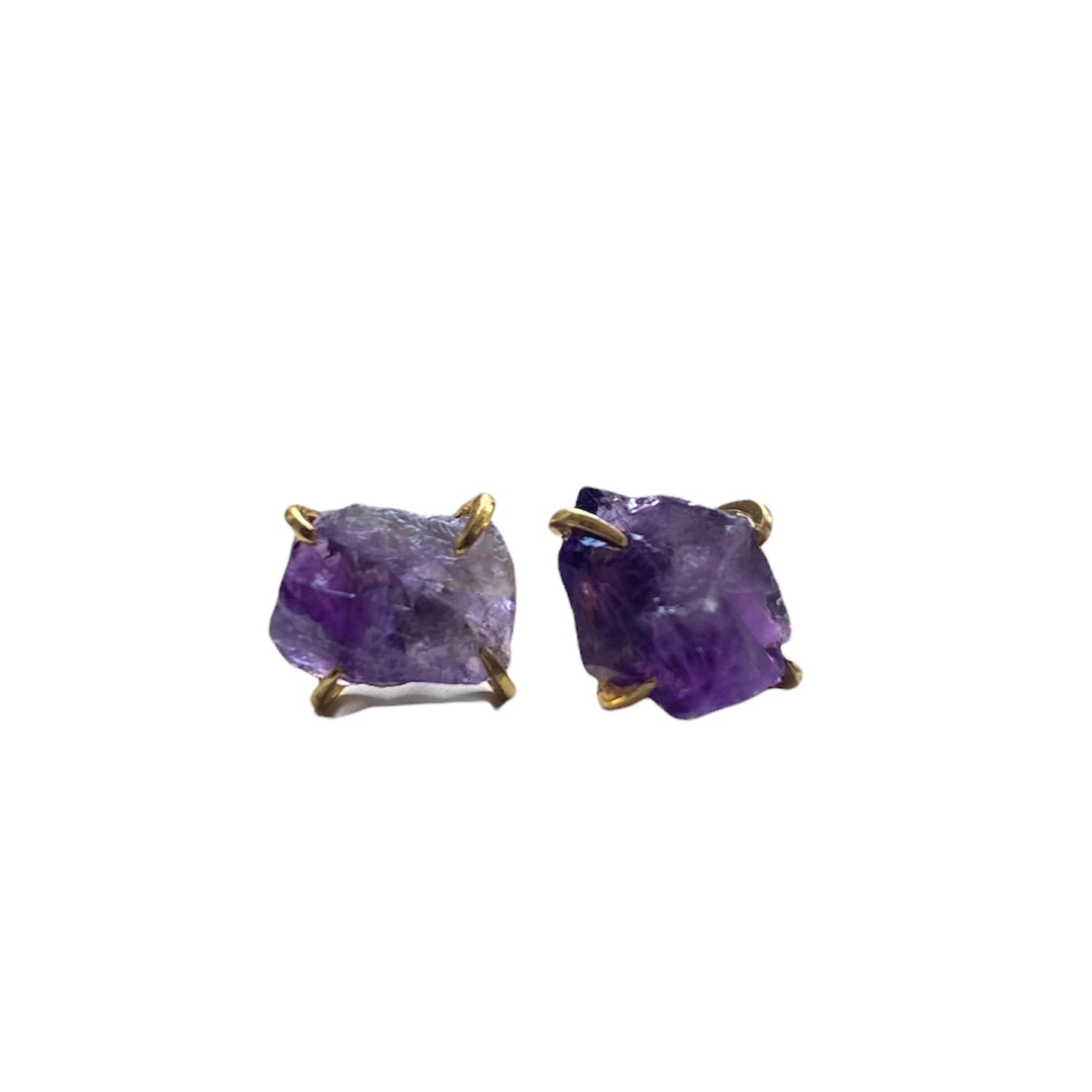 A pair of gold plated raw crystal nugget claw studs showcasing unique crystal designs.