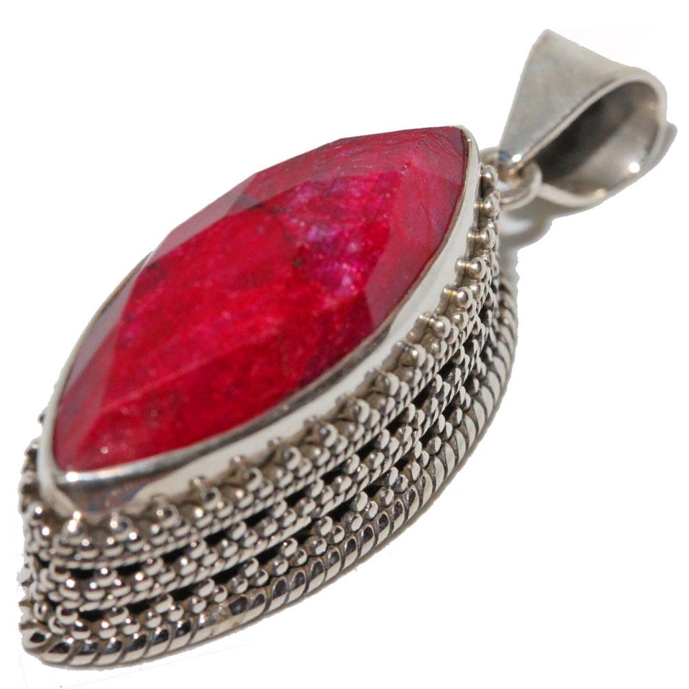 A stunning Raw Ruby Marquise Cut Pendant featuring a genuine red ruby stone set in intricate sterling silver filigree work.