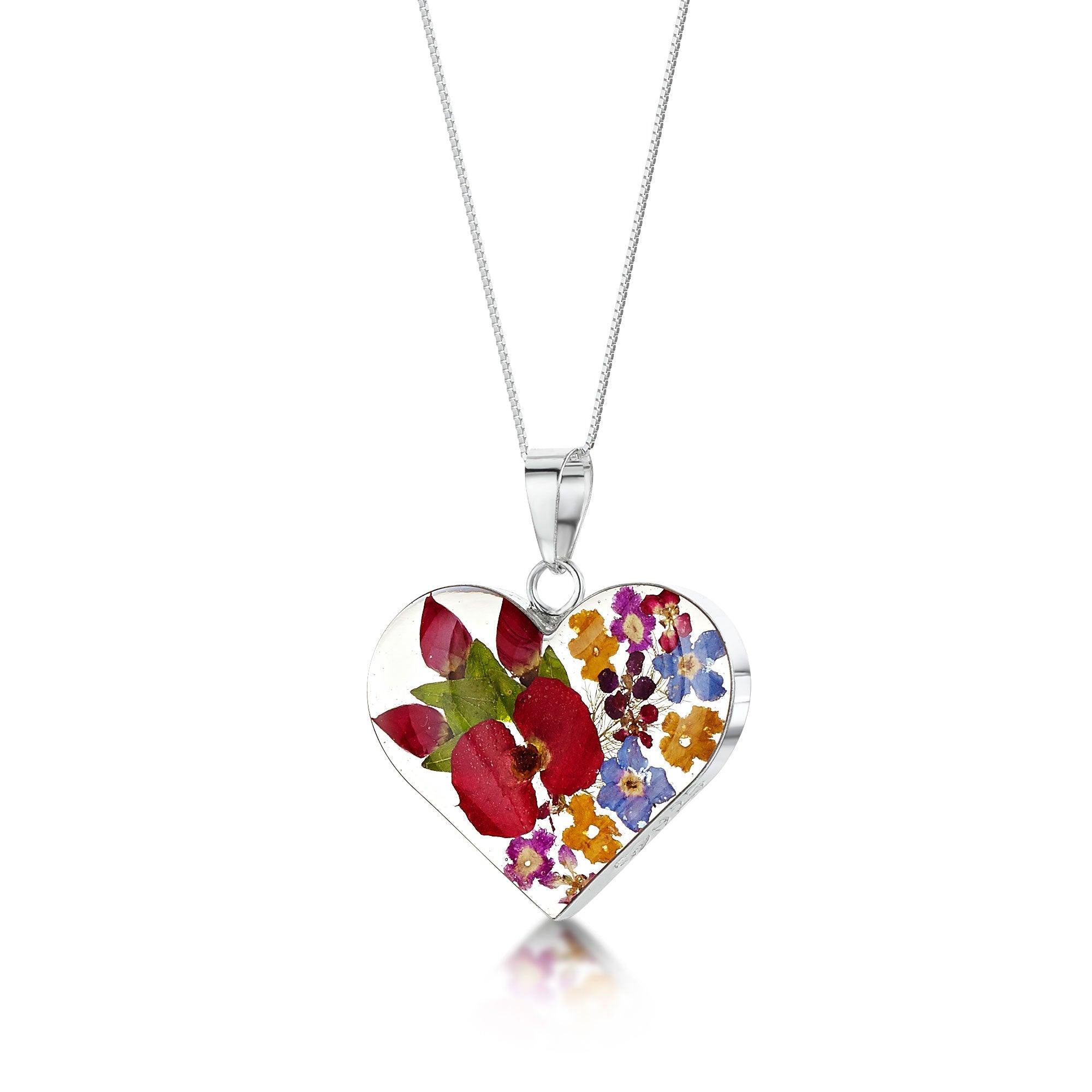 Real Flower Heart Necklace by Shrieking Violet, featuring a large heart pendant made with real flowers and a sterling silver adjustable chain.