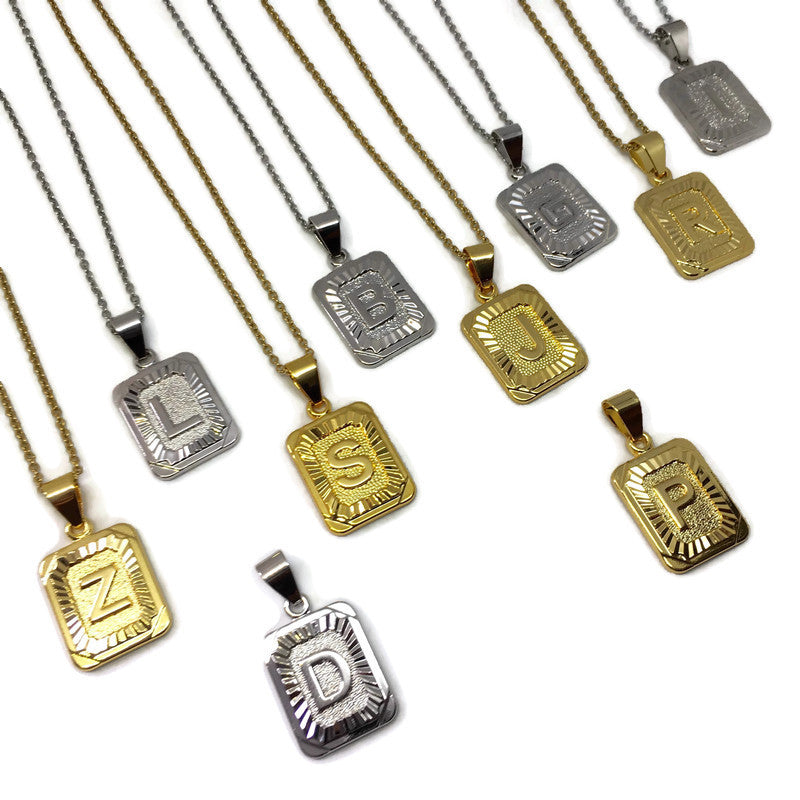 Rectangle Tablet Initial Necklace made of 18ct gold plated stainless steel, featuring a customizable letter pendant and a durable chain.