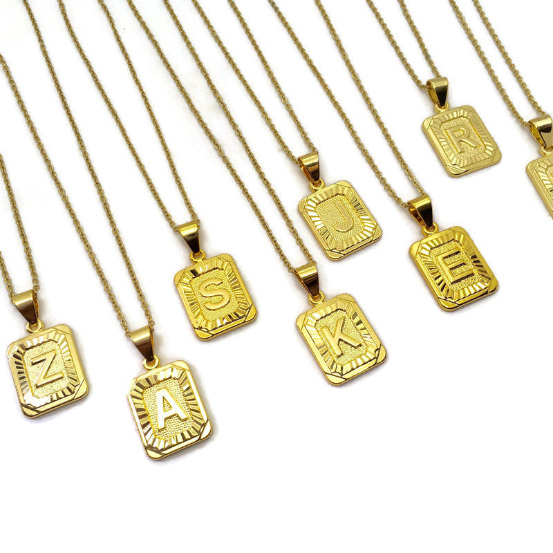 Rectangle Tablet Initial Necklace made of 18ct gold plated stainless steel, featuring a customizable letter pendant and a durable chain.