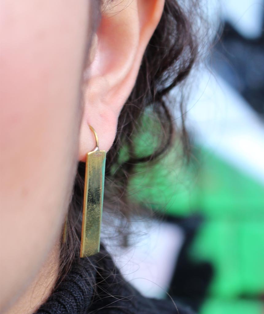 Stylish rectangular drop earrings made of brass and silver, featuring a unique design perfect for festivals and everyday wear.