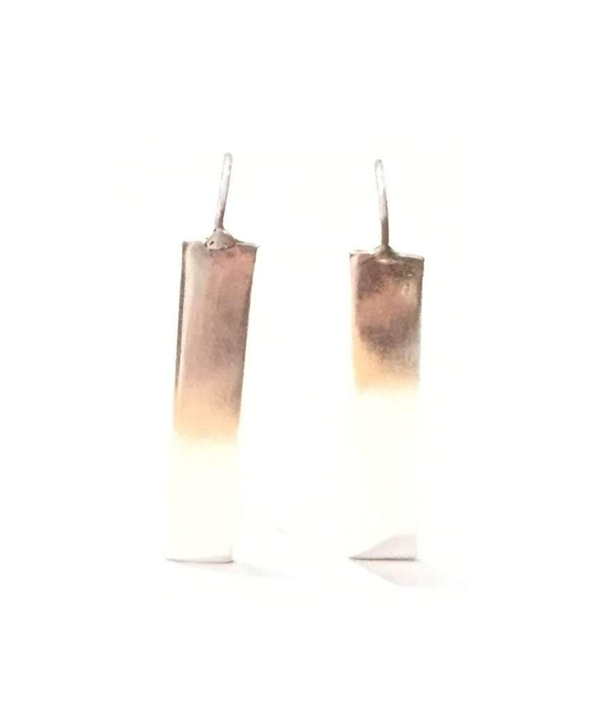 Stylish rectangular drop earrings made of brass and silver, featuring a unique design perfect for festivals and everyday wear.