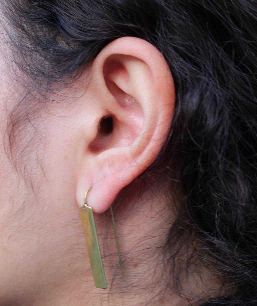 Stylish rectangular drop earrings made of brass and silver, featuring a unique design perfect for festivals and everyday wear.