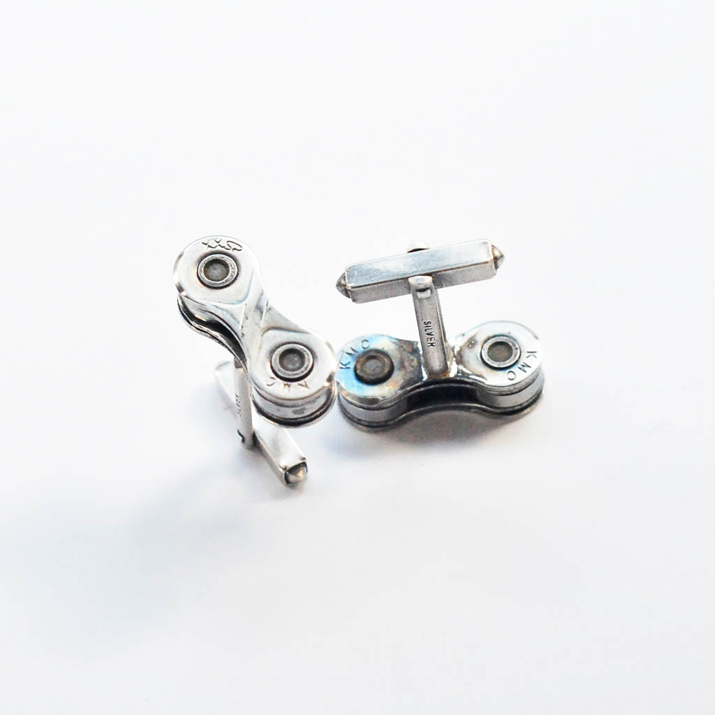 Handcrafted Recycled Bicycle Chain Cufflinks in three colors, featuring silver plated links.