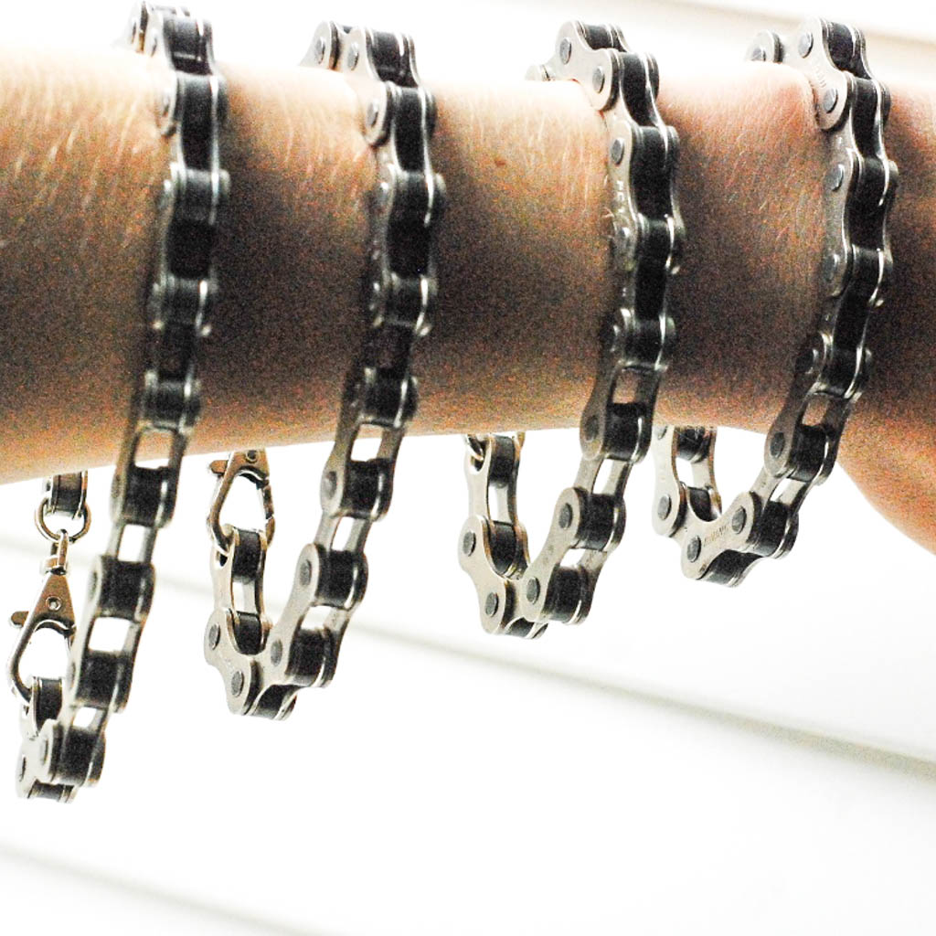 A stylish Recycled Bike Chain Bracelet made from upcycled bike chains, showcasing its unique design and eco-friendly materials.