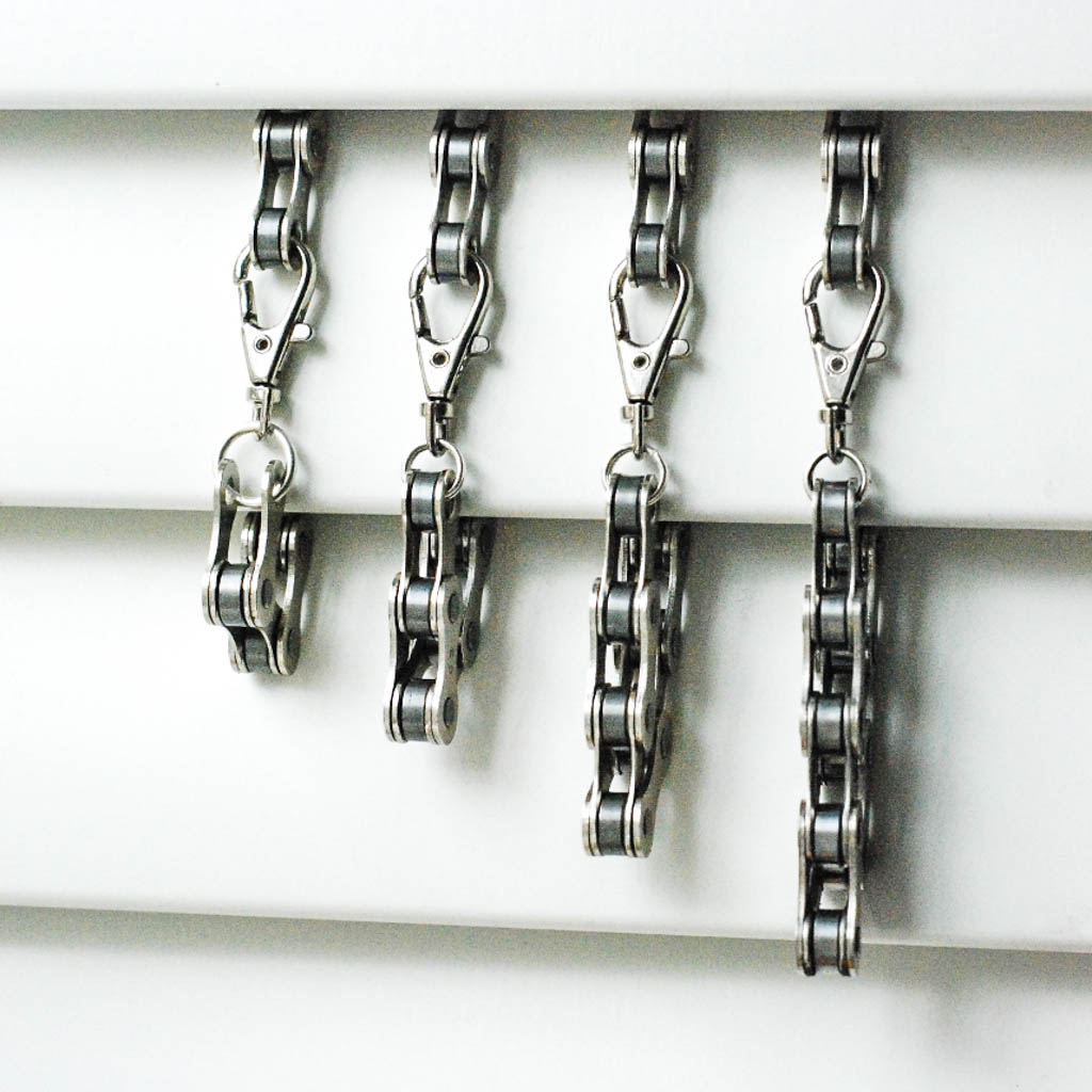 A stylish Recycled Bike Chain Bracelet made from upcycled bike chains, showcasing its unique design and eco-friendly materials.