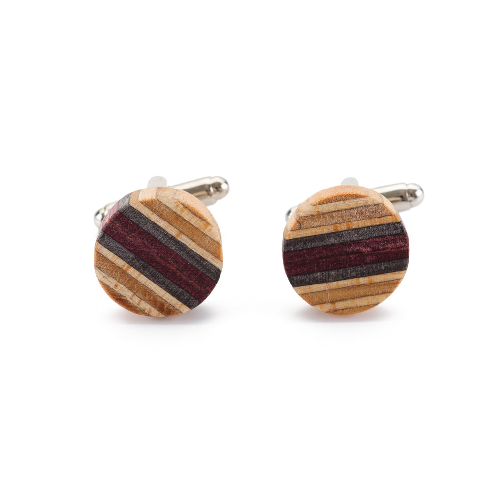 Handcrafted Recycled Skateboard Wooden Round Cufflinks showcasing vibrant colors and unique patterns, presented in a luxury gift box.