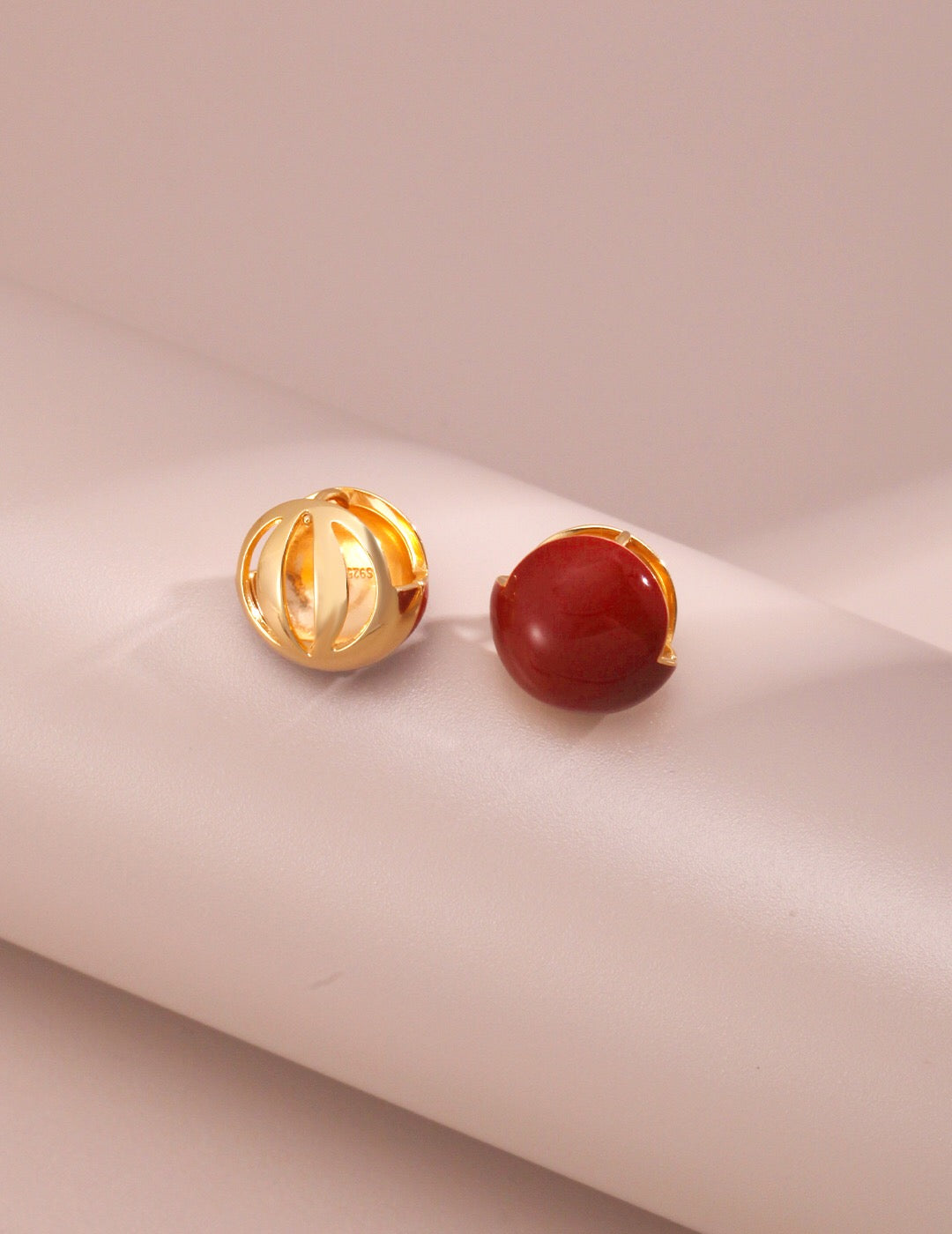 A pair of handmade Red Cherry Enamel Glaze Earrings featuring a vibrant cherry color and gold vermeil accents, elegantly displayed.