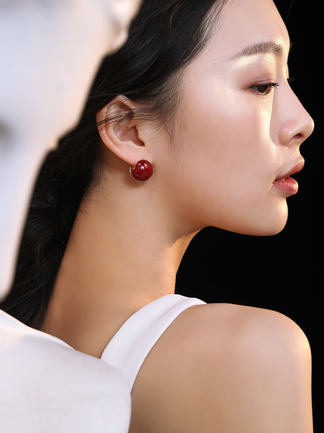 A pair of handmade Red Cherry Enamel Glaze Earrings featuring a vibrant cherry color and gold vermeil accents, elegantly displayed.