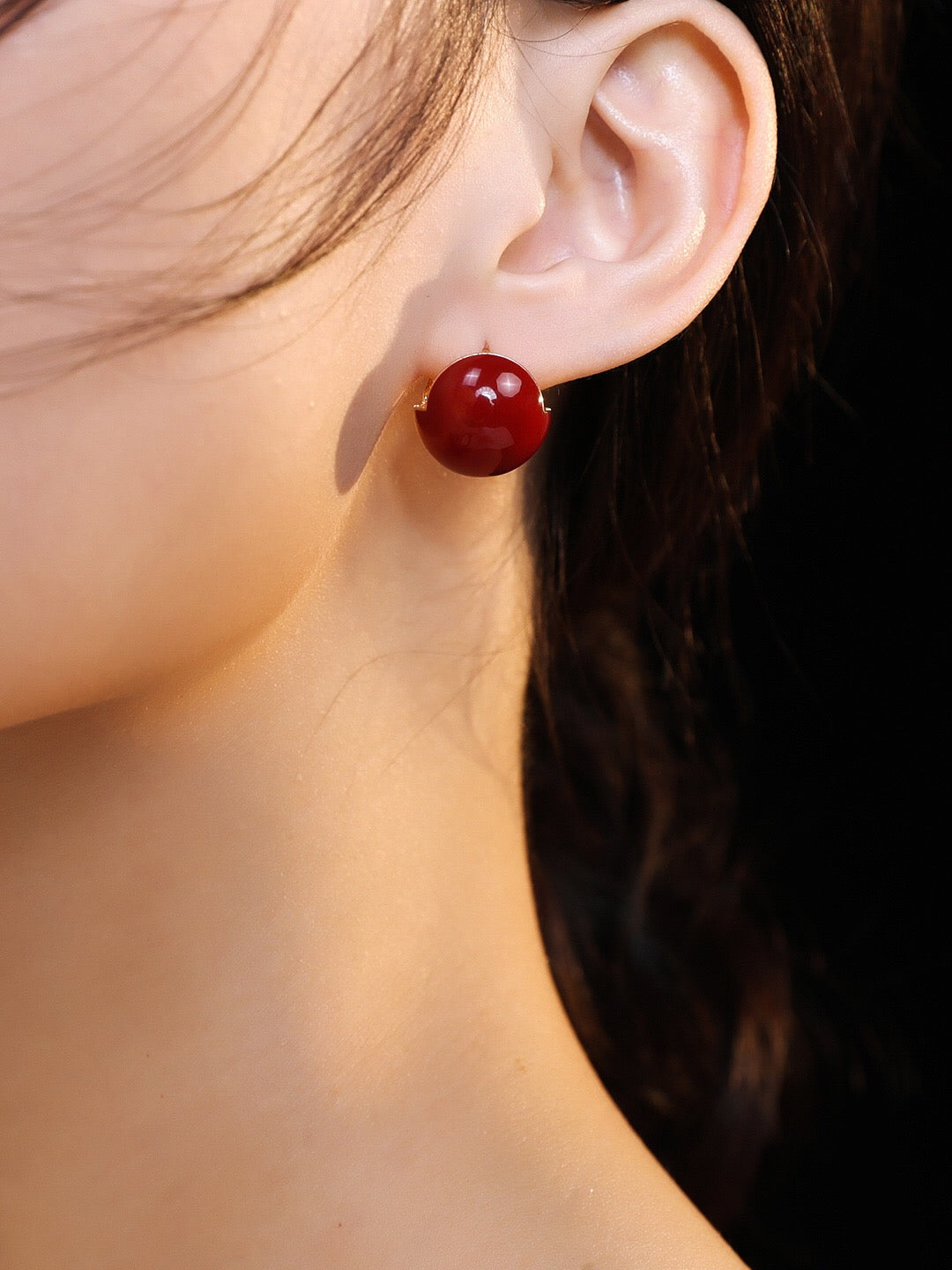 A pair of handmade Red Cherry Enamel Glaze Earrings featuring a vibrant cherry color and gold vermeil accents, elegantly displayed.