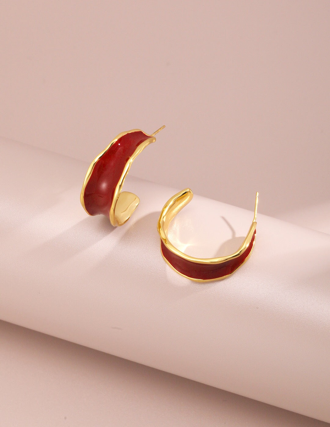 A pair of handmade Red Drip Glaze C Shape Earrings featuring sterling silver and gold vermeil, showcasing a vibrant drip glaze finish.