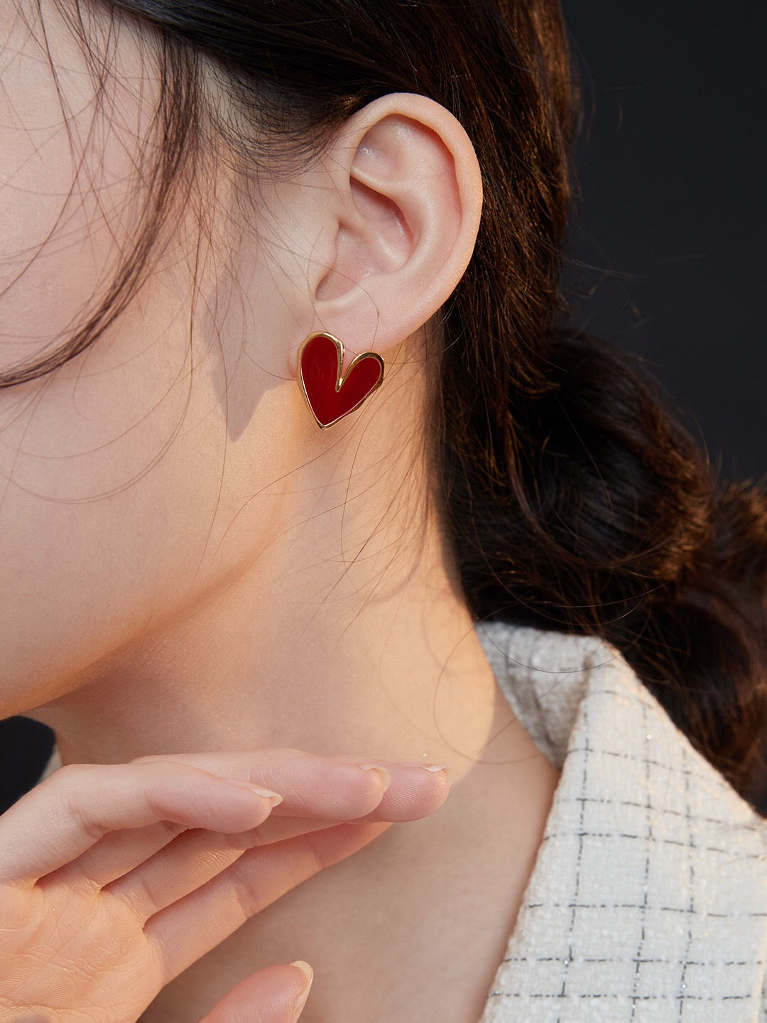 A pair of handmade Red Drip Glaze Folded Love Heart Earrings featuring a unique drip glaze finish and gold vermeil accents.