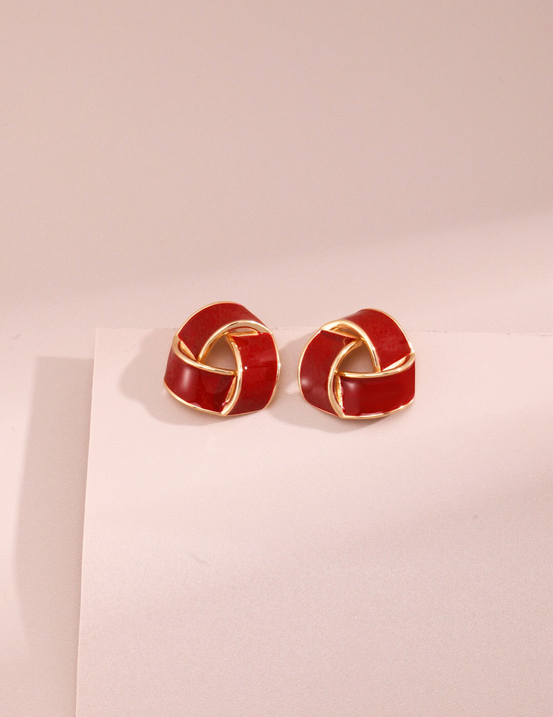 Handmade Red Drip Glaze Triangle Earrings featuring gold vermeil accents, showcasing a unique dripping glaze design.