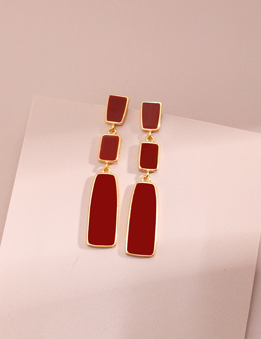 A pair of handmade Red Dripping Glaze Link Drop Earrings featuring a vibrant drip glaze finish and gold vermeil accents.