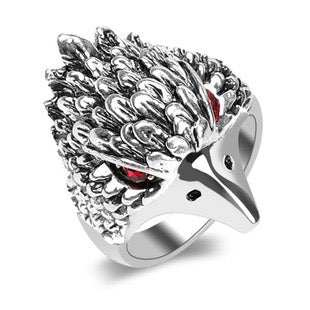 A beautifully crafted Red Eye Eagle Ring featuring a striking eagle design with red rhinestones, made from durable alloy.