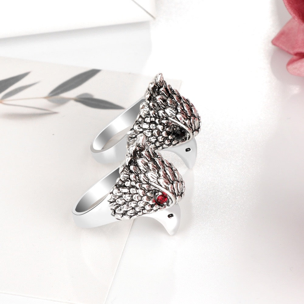 A beautifully crafted Red Eye Eagle Ring featuring a striking eagle design with red rhinestones, made from durable alloy.