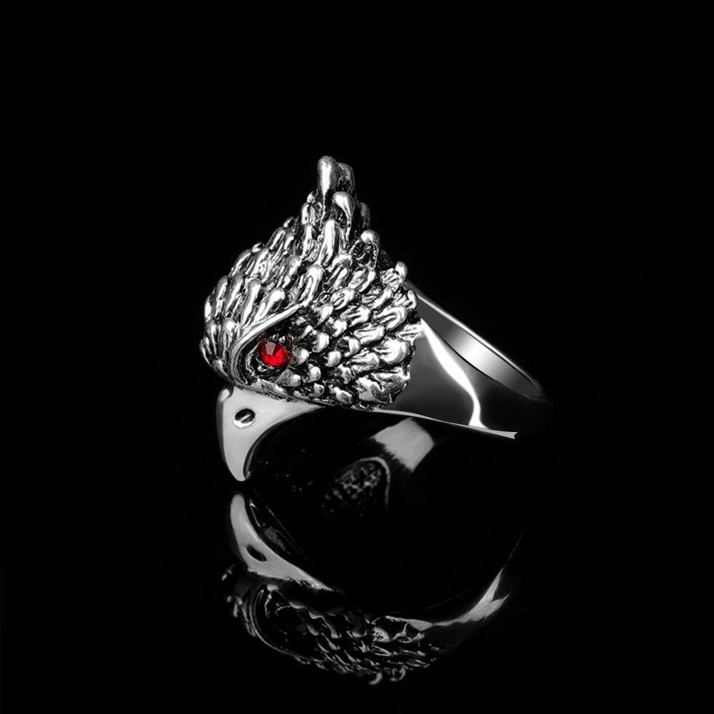 A beautifully crafted Red Eye Eagle Ring featuring a striking eagle design with red rhinestones, made from durable alloy.