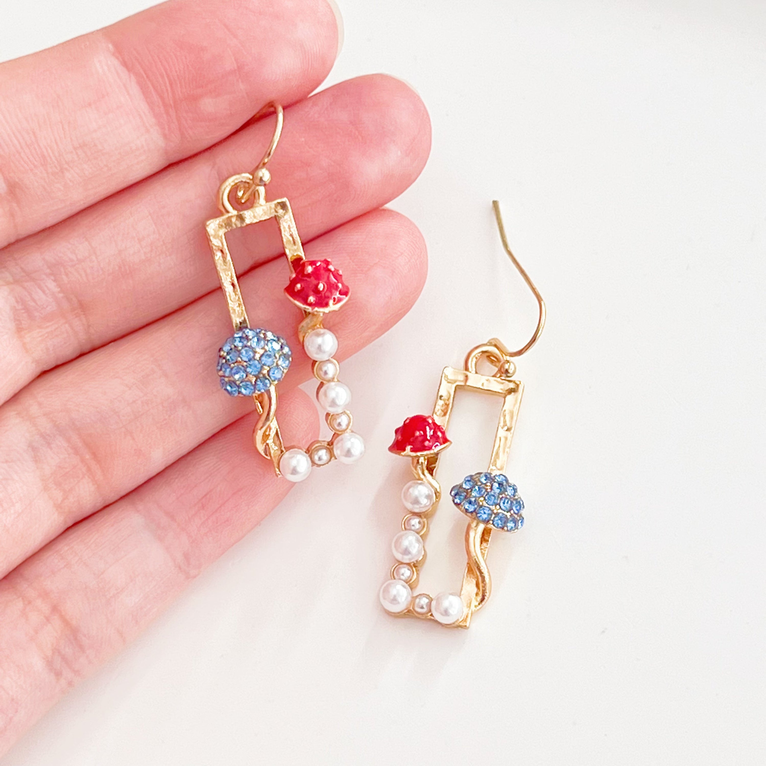 Red Fly Agaric and Blue Roundhead Mushroom Good Luck Drop Earrings with zircon crystals, showcasing vibrant colors and intricate design.