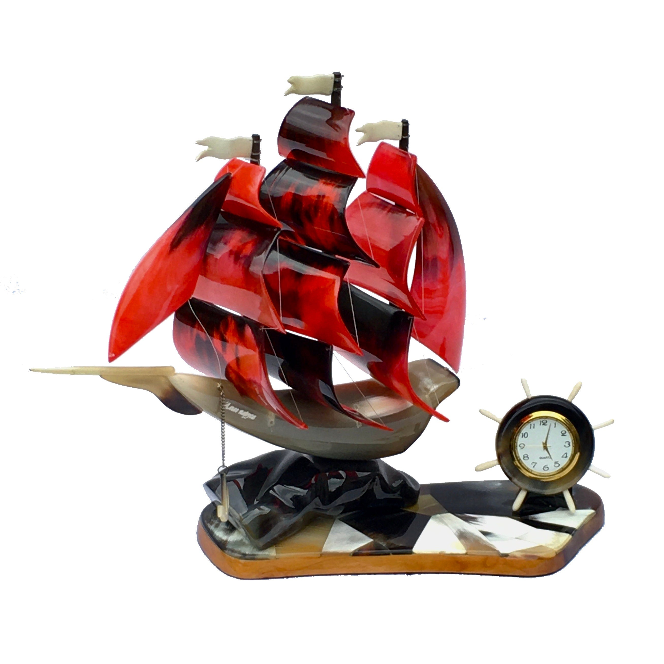 A beautifully crafted red ship souvenir with intricate details, featuring a battery-operated clock and engraved hull, perfect for office decor.