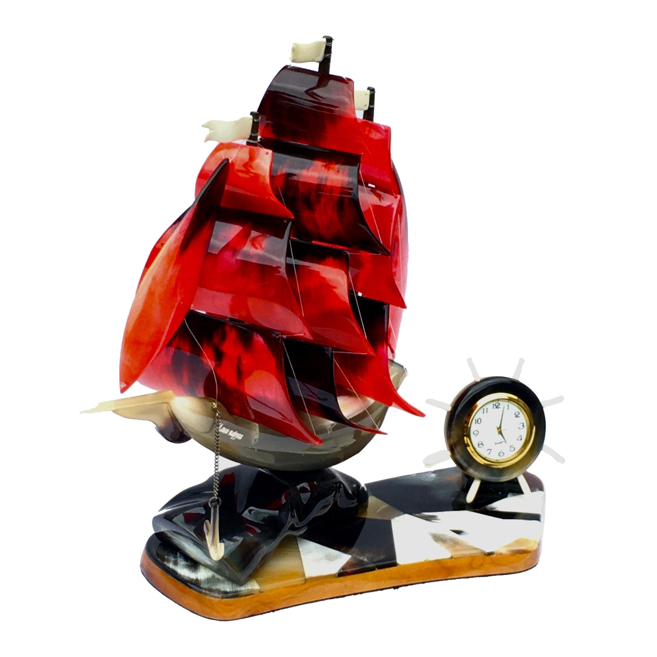 A beautifully crafted red ship souvenir with intricate details, featuring a battery-operated clock and engraved hull, perfect for office decor.