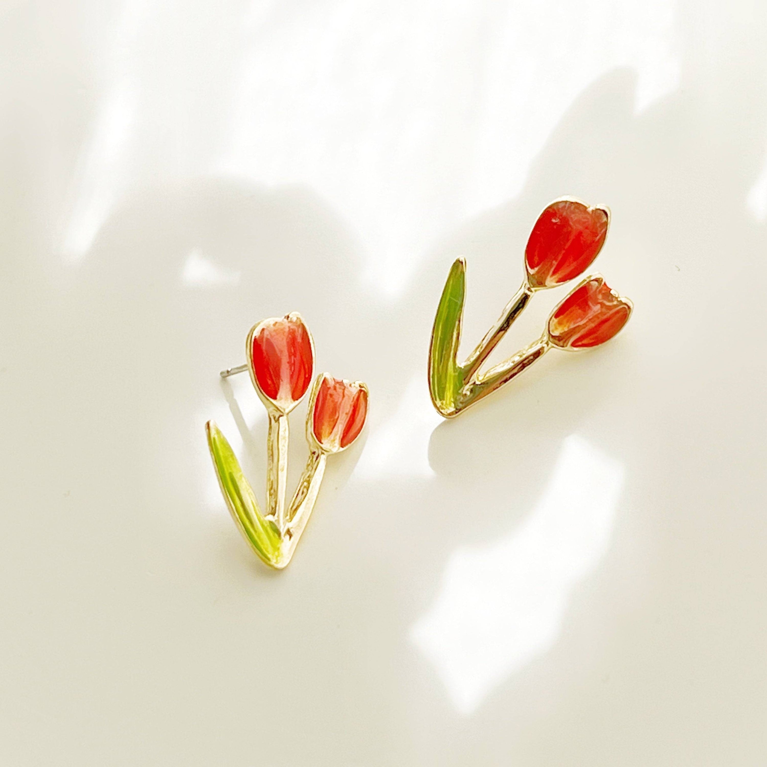 A pair of elegant red tulip stud earrings made of gold plated bronze and sterling silver, beautifully designed for spring fashion.