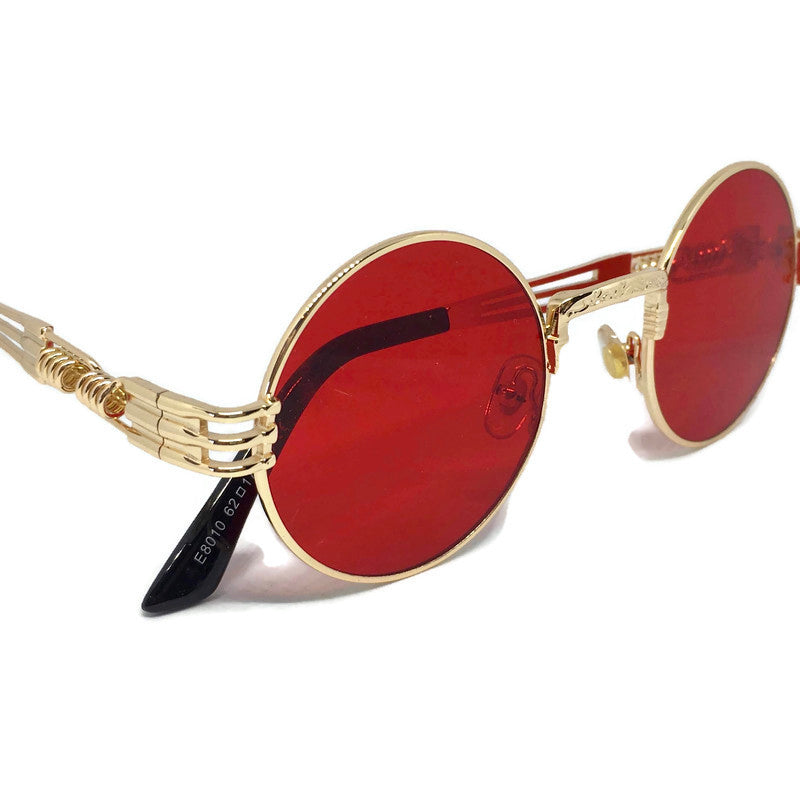 Stylish red and gold sunglasses made from metal and acrylic, featuring a non-tarnish finish and unisex design.