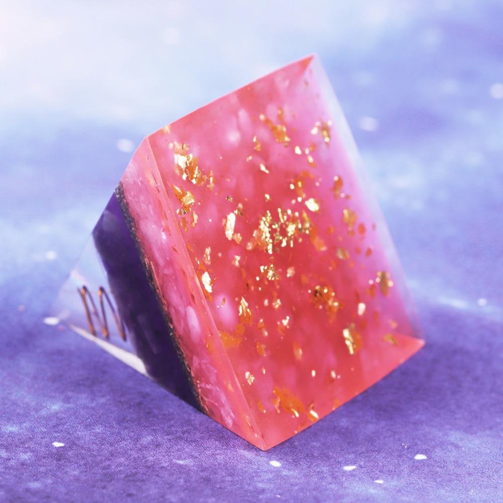 A handcrafted Reiki Healing Energy Amethyst Orgone Pyramid featuring amethyst, rose quartz, copper, and crystal points, designed for EMF protection and chakra healing.