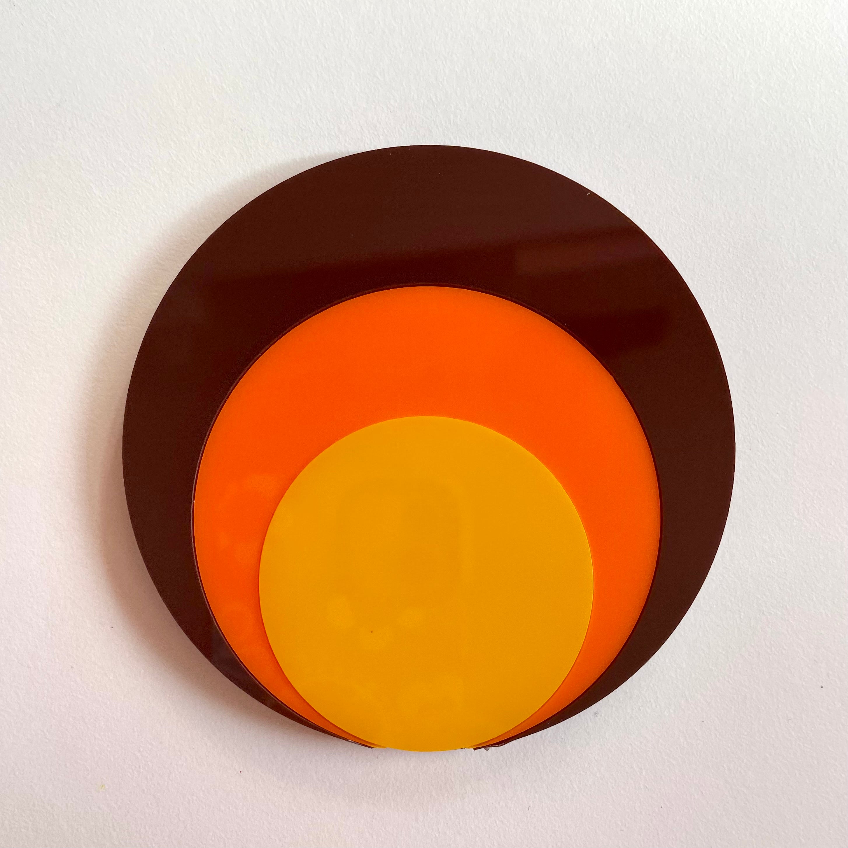 A vibrant Retro Circle Coaster featuring a Mod Target design, made from laser cut acrylic with a cork base, measuring approximately 9.5cm in diameter.