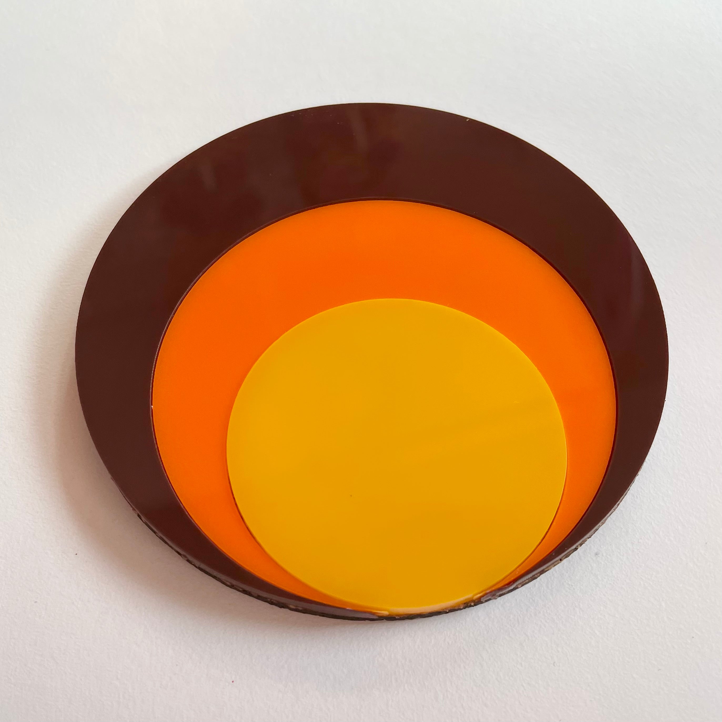 A vibrant Retro Circle Coaster featuring a Mod Target design, made from laser cut acrylic with a cork base, measuring approximately 9.5cm in diameter.