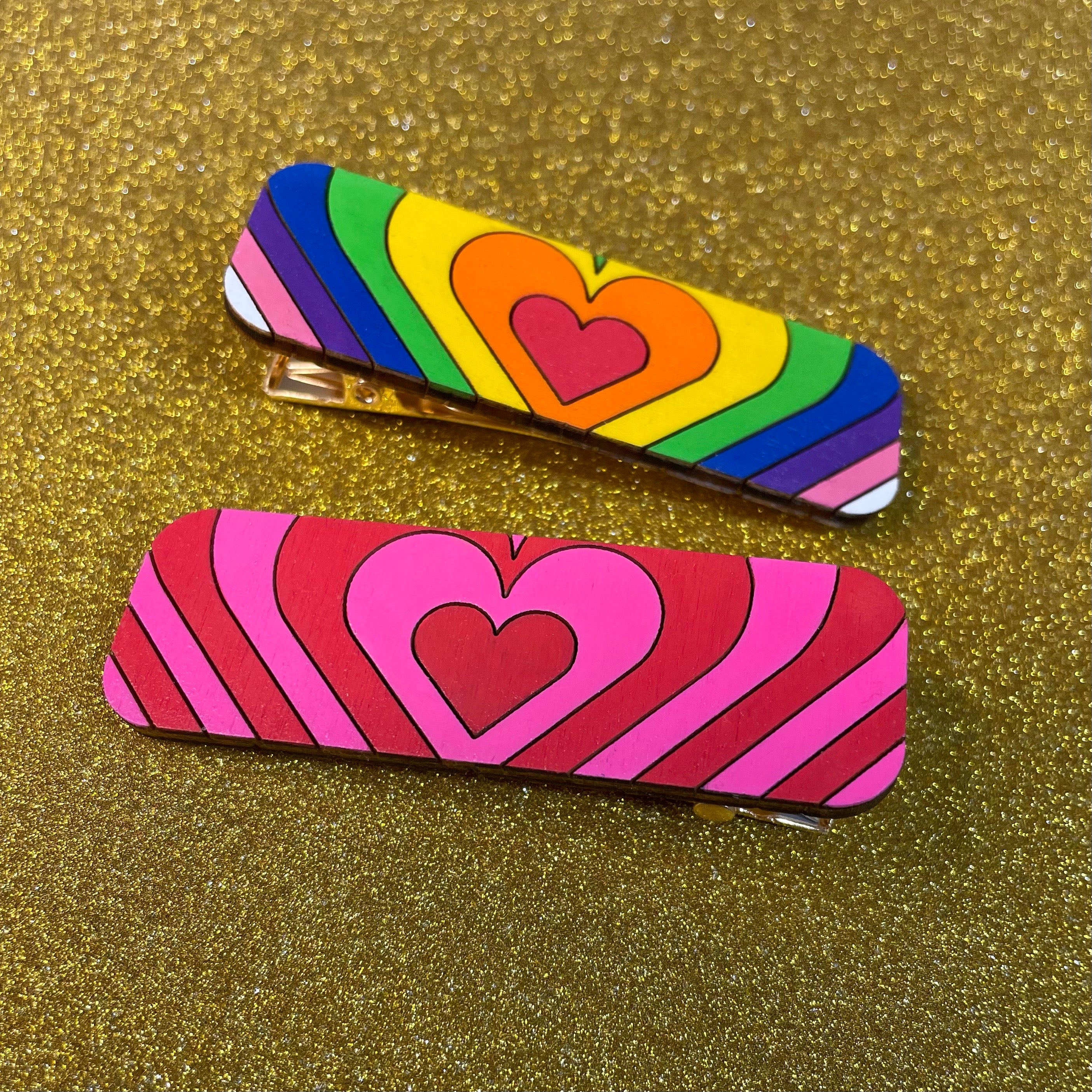 A stylish Retro Heart Hairclip made of laser cut wood with a gold plated clip, showcasing a vintage design.