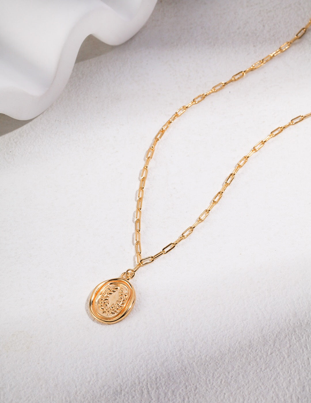 A beautiful Retro Wheat Chain Necklace made of gold vermeil, showcasing an intricate design with a pendant.