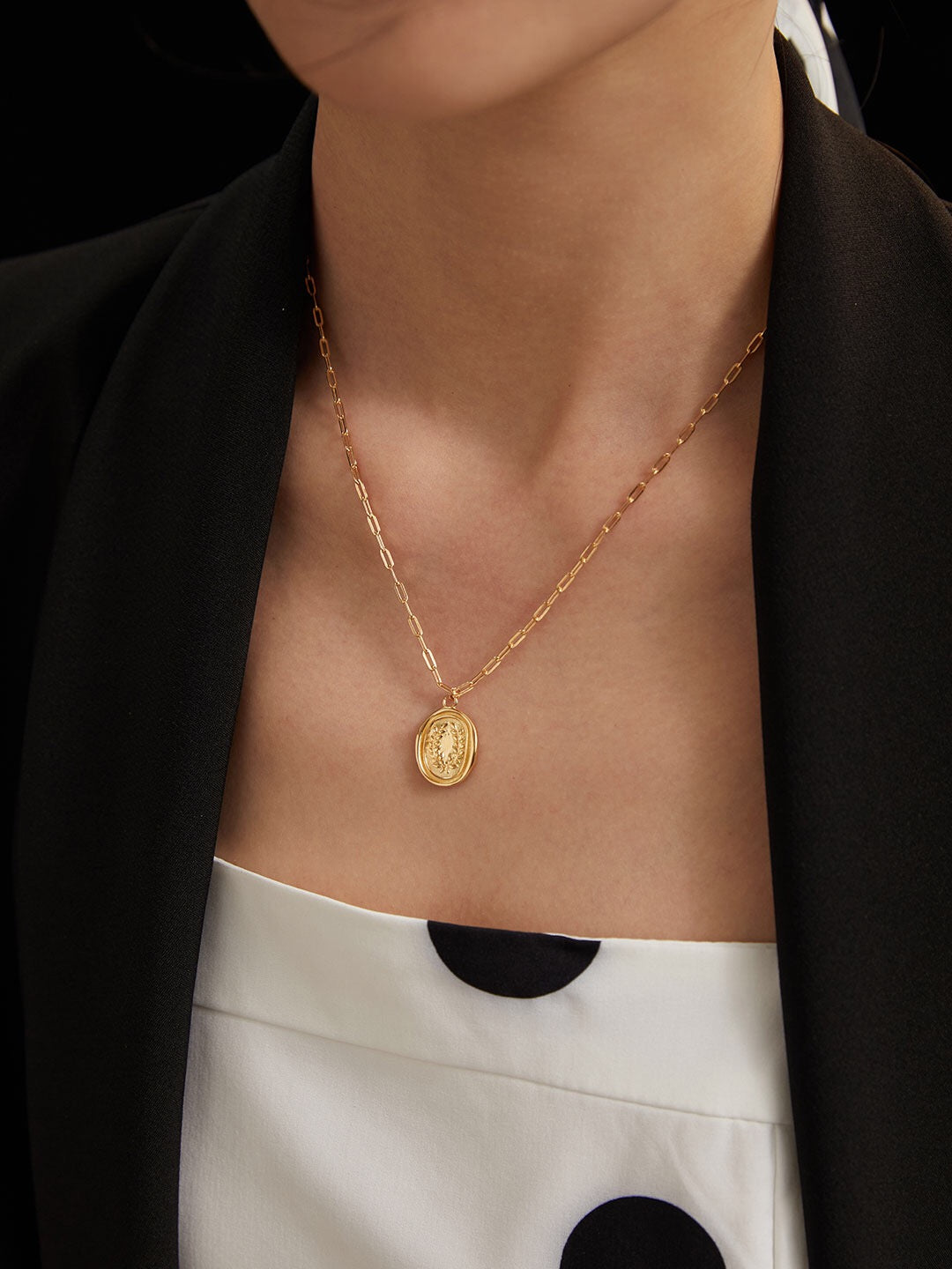 A beautiful Retro Wheat Chain Necklace made of gold vermeil, showcasing an intricate design with a pendant.