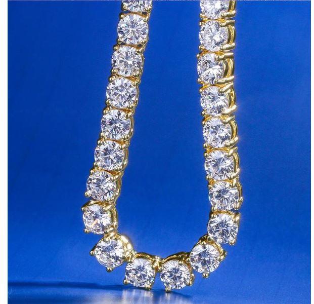 ROCK 4 MM One Row Tennis Chain featuring cubic zirconia stones set in brass, showcasing a glamorous design suitable for various occasions.