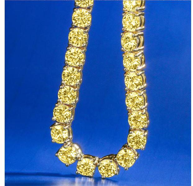 ROCK 4 MM One Row Tennis Chain featuring cubic zirconia stones on a brass base, showcasing its elegant design and shimmering quality.